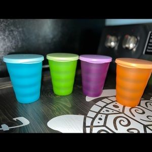 Multicolored tupperware cups